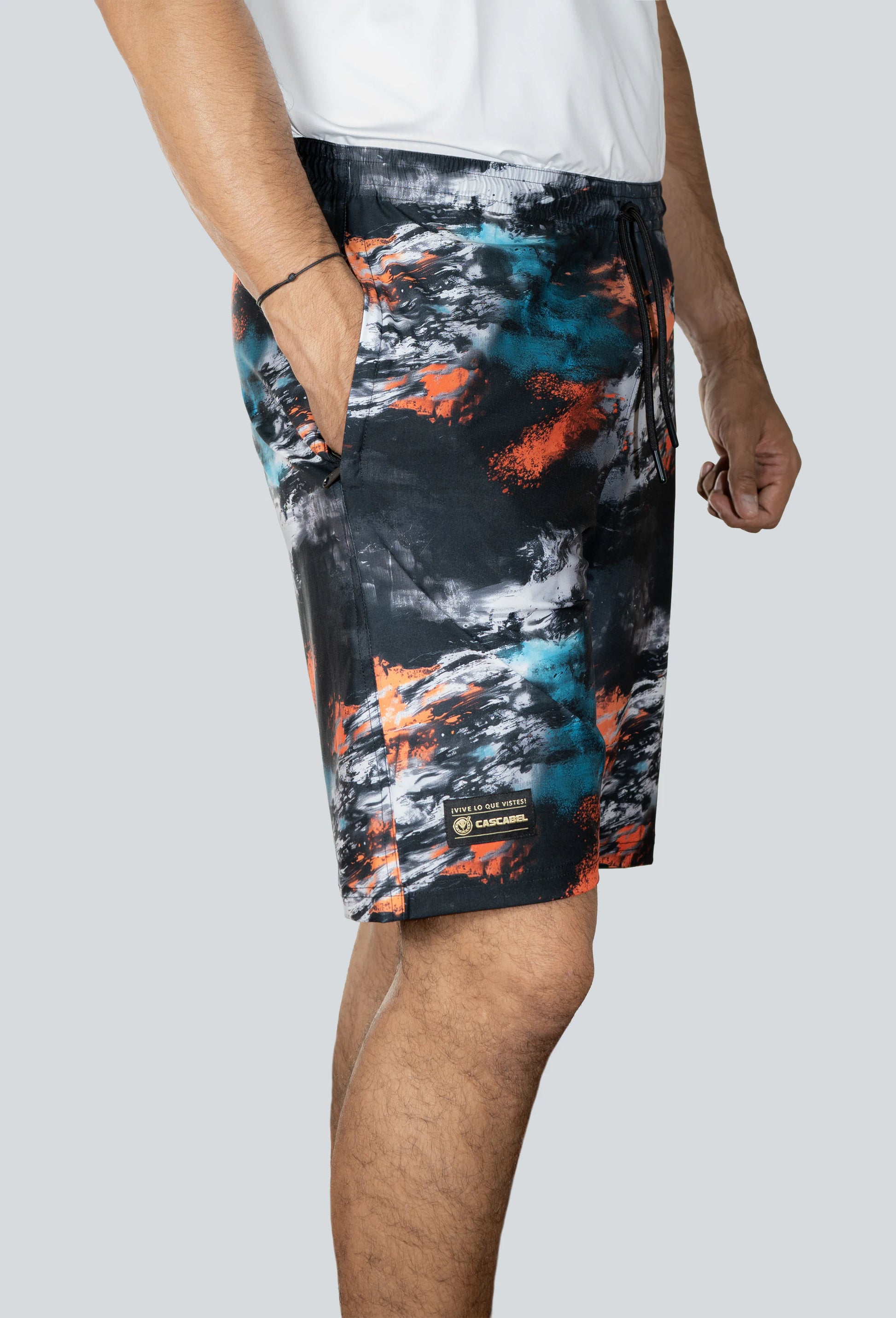 Pantaloneta licrada cierre bolsillos cammo mancha azul naranja negro