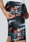 Pantaloneta licrada cierre bolsillos cammo mancha azul naranja negro