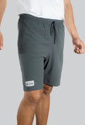 Pantaloneta licrada cierre bolsillos gris oscuro