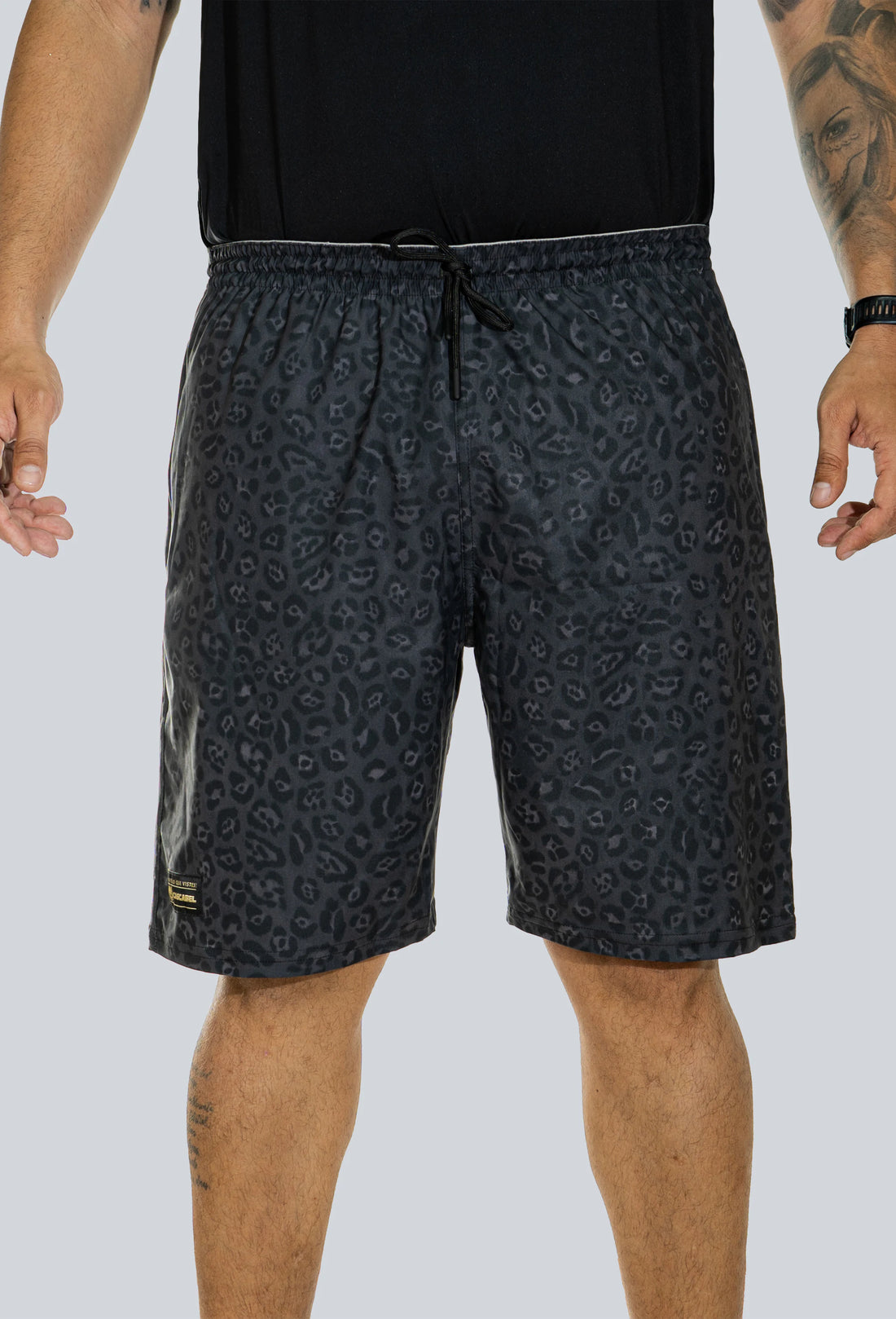 Pantaloneta licrada cierre bolsillos jaguar print gris