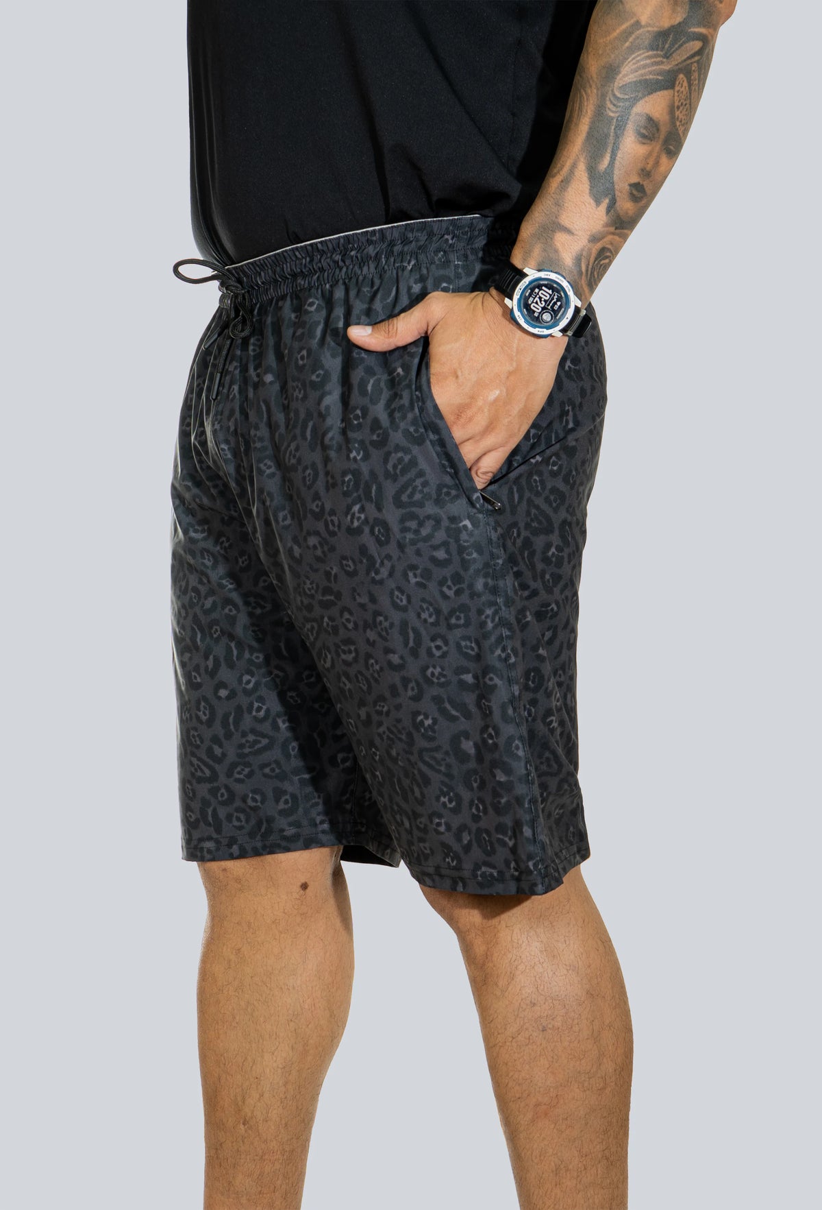 Pantaloneta licrada cierre bolsillos jaguar print gris
