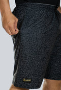 Pantaloneta licrada cierre bolsillos jaguar print gris