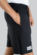 Pantaloneta licrada cierre bolsillos negro