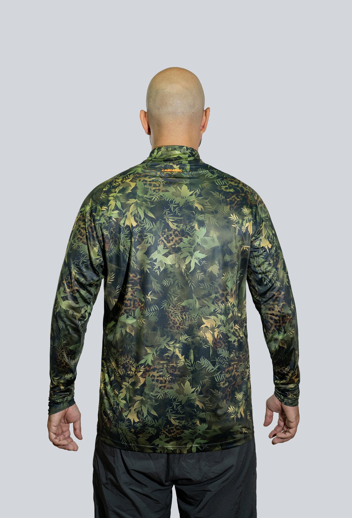 Jersey cuello tortuga manga ranglan cammo arbóreo jaguar